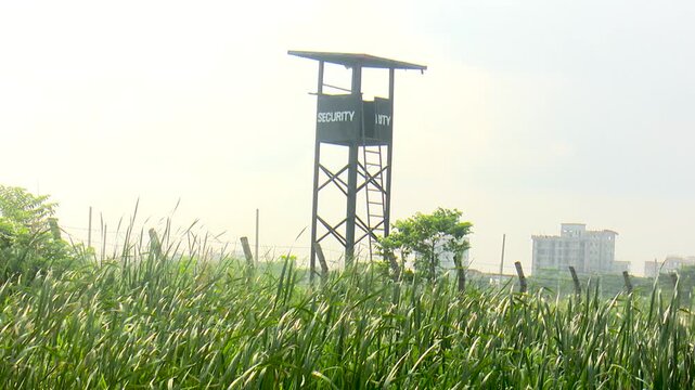 Rural Watch Tower Overlooking Agricultural Fields and Green Countryside Landscape in Bangladesh