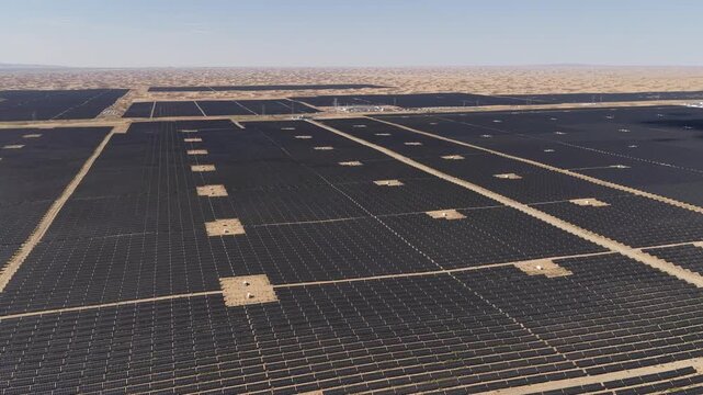 Aerial View of Utility-Scale Solar Farm with Battery Energy Storage System in Arid Desert