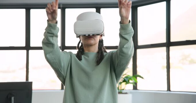 Non-binary African wearing white VR headset, sage top, prompted by UI cues, tapping at window