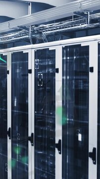 Animation of multiple icons, viewfinders with lens flares over data server room