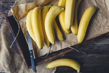 Fresh bananas on the dark background © Thai