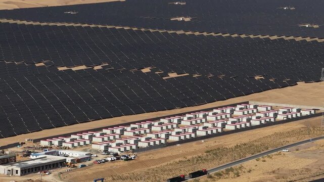 Aerial View of Utility-Scale Solar Farm with Battery Energy Storage System in Arid Desert