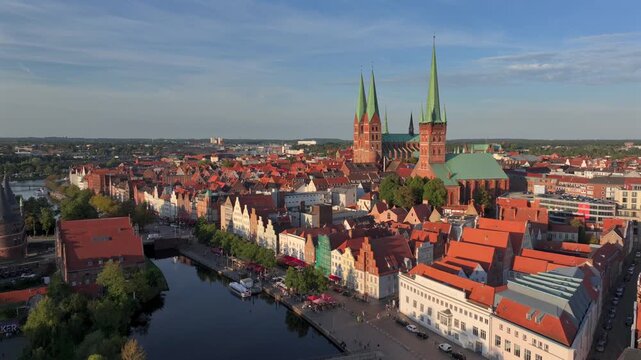 Lubeck city Aerial shot. Saint Marie and saint peter churches, Holstentor Gothic gate, Schleswig-Holstein land, Germany