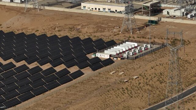 Aerial View of Utility-Scale Solar Farm with Battery Energy Storage System in Arid Desert