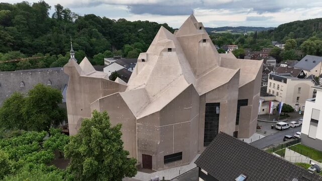 Nevigeser Wallfahrtsdom, Brutalist Neviges Pilgrimage Church Aerial View on Cloudy Day, North Rhine Westfalia, Germany.
