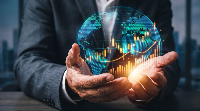 Businessman holding a digital globe with stock market financial growth charts and data analytics, global business and investment concept