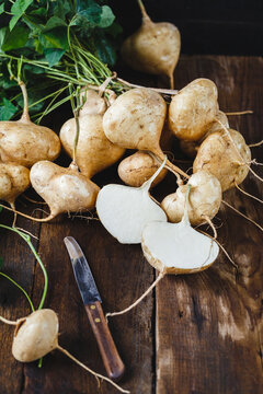 Fresh yam beans on the dark background
