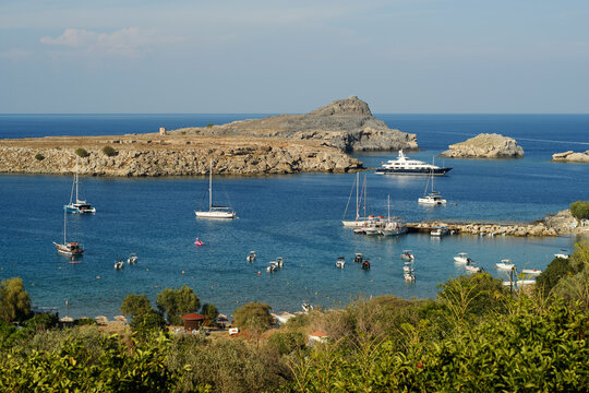 Megali Paralia Beach (also known as the main beach in Lindos) - the largest sandy beach of Lindos (Rhodes)