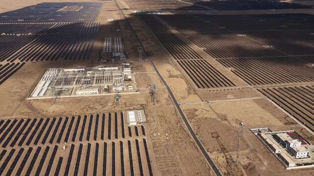 Aerial View of Utility-Scale Solar Farm with Battery Energy Storage System in Arid Desert