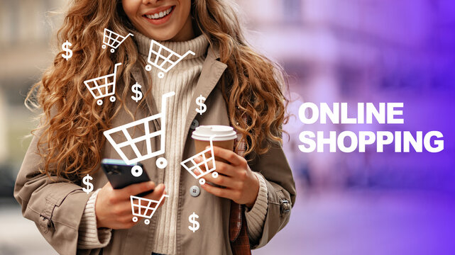 Woman using phone for online shopping and holding a coffee cup in a city setting during the daytime