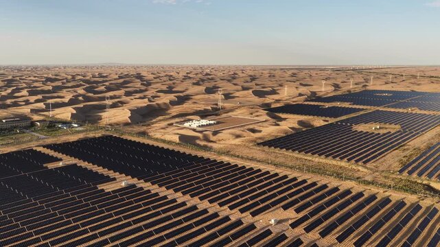 Aerial View of Utility-Scale Solar Farm with Battery Energy Storage System in Arid Desert