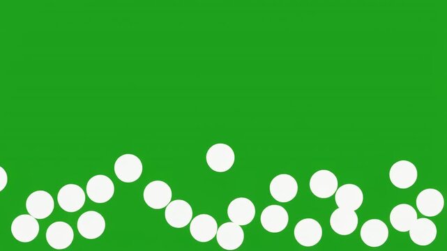 White spheres moving across green background with black in center cinematic motion abstract concept