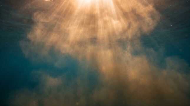 Sediment clouds illuminated by dramatic sunbeams piercing through deep dark ocean water creating ethereal underwater atmosphere
