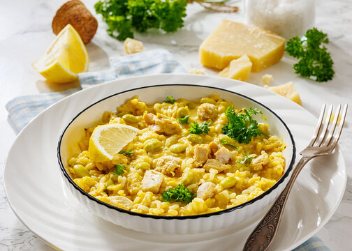 Creamy chicken and yellow rice bowl on a table