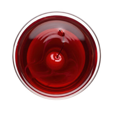 A maraschino cherry in a glass of red liquid isolated on transparent background