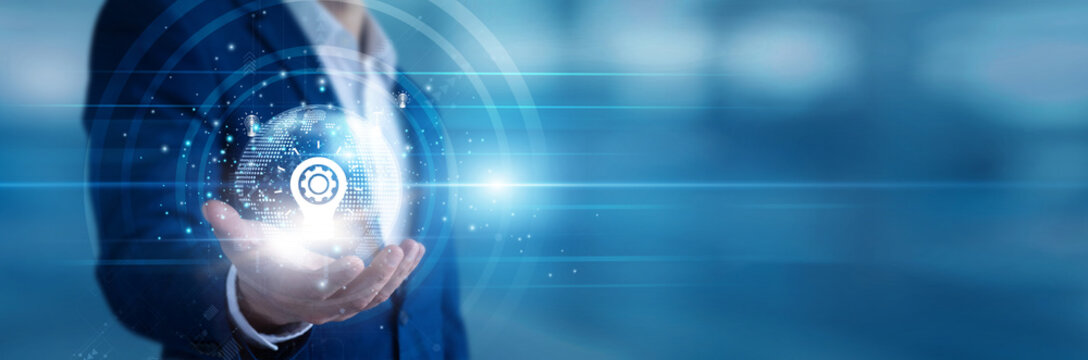 Business consultant holding a handheld tablet designing custom Solutions for corporate clients. Enterprise architect implementing software frameworks and solving complex workflow problems.