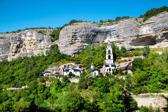 The church and monastery in the rocks on a clear, sunny day. Nature, landscape, World tourism.