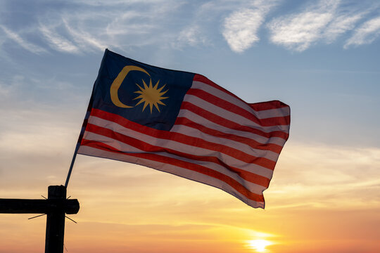 National Flag of Malaysia during sunset in Odec beach Sabah Malaysia