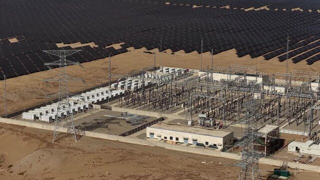 Aerial View of Utility-Scale Solar Farm with Battery Energy Storage System in Arid Desert