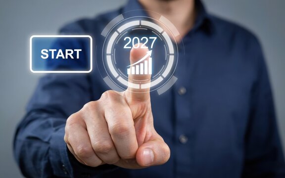 Businessman pointing at a digital interface with 2027 growth chart