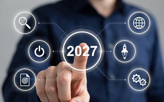 Businessman touching a virtual interface with 2027 year