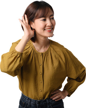 Asian woman smiling with hand raised near ear and confident pose wearing mustard blouse isolated on transparent background