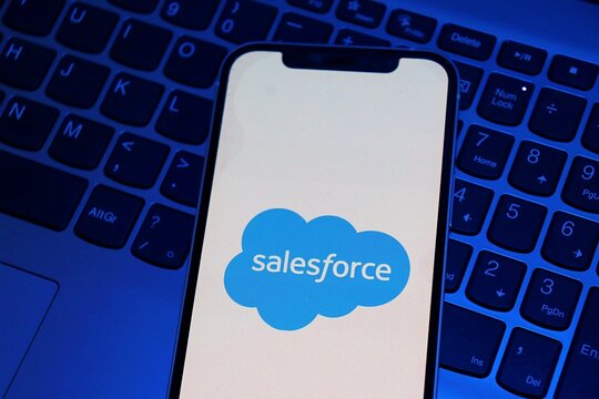 Salvador, Brazil - August 12, 2026: Salesforce logo placed on top of a laptop keyboard. SaaS technology, cloud computing, and business innovation concept.