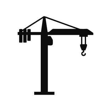 Black silhouette of a construction tower crane isolated on white background