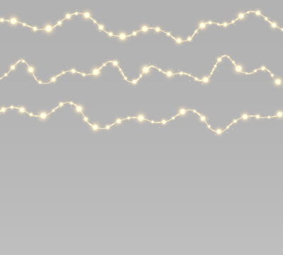Festive garland with glowing lights, sparkling lamps for New Year decoration.