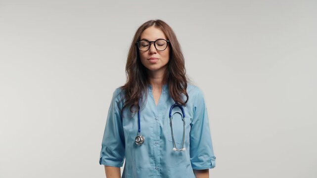 Female Doctor Making Clear Shh Silence Gesture With Finger To Lips, Professional Physician Asking For Quiet, Privacy, Confidentiality, Secret Information And Discreet Communication
