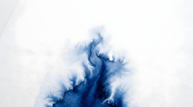 Abstract blue watercolor background with soft fluid ink bleed and artistic texture isolated on white background