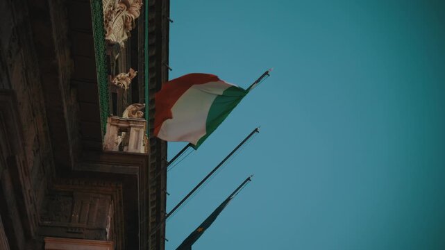 Italian flag at an institutional monument in Naples