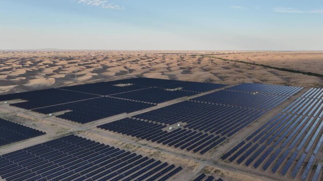 Aerial View of Utility-Scale Solar Farm with Battery Energy Storage System in Arid Desert