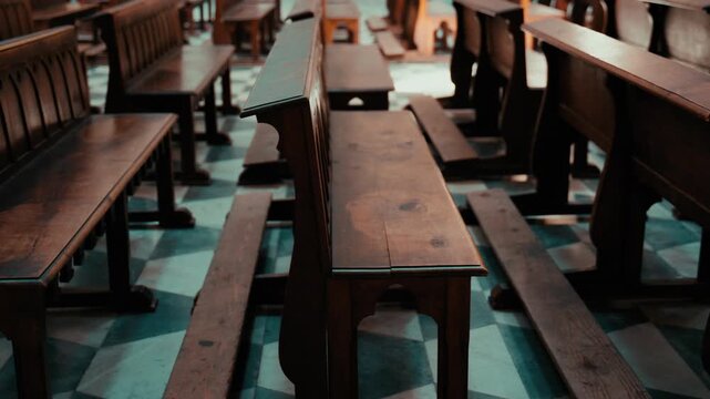Wooden prayer benches in a church in Naples, Italy