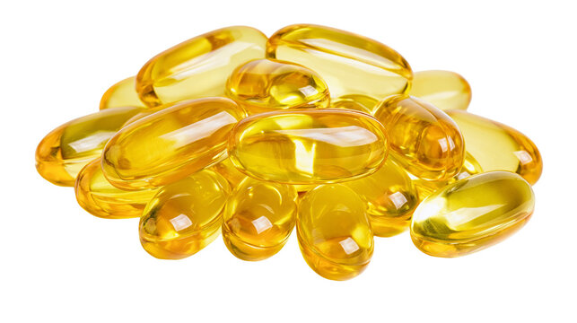 Pile of translucent yellow oval softgel capsules, isolated on transparent background