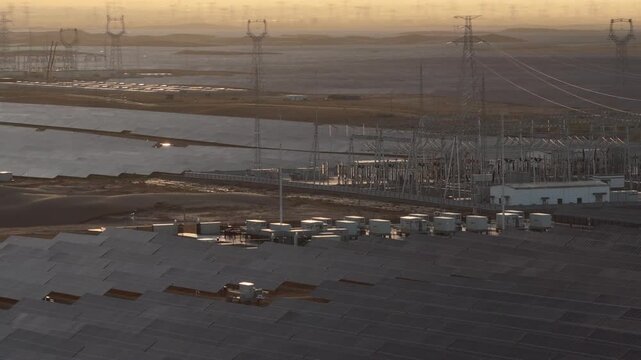 Aerial View of Utility-Scale Solar Farm with Battery Energy Storage System in Arid Desert