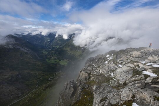 Famous curvy mountain road Fylkesvei 63 or Geirangervegen, which leads from Geiranger to the Djupvasshytta plateau, view of the Geiranger fjord from the 1476 meter high mountain peak and viewpoint Dalsnibba, Stranda, M&oslash;re og Romdal, Norway