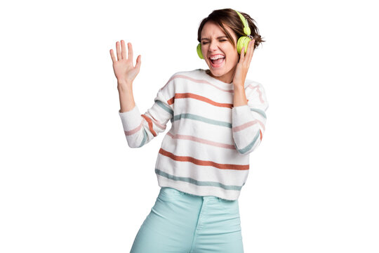 Photo of shiny pretty young woman dressed striped pullover headphones dancing singing arn hand side isolated grey color background