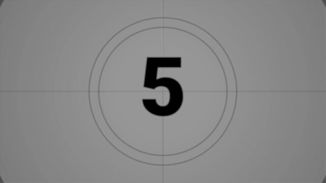 Vintage, old, projected film head leader with realtime countdown clock. from 10 to 0 seconds. Worn and damaged in style including marks, scratches and film grain to add a vintage look to your video.