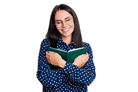 Portrait of attractive cheerful businesslady reading embracing interesting book isolated over grey pastel color background