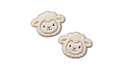 Two fluffy lamb face embroidered plush patches on a transparent background © Vitalo4ok