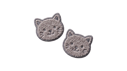 Two fluffy grey cat face embroidered plush patches on a transparent background © Vitalo4ok