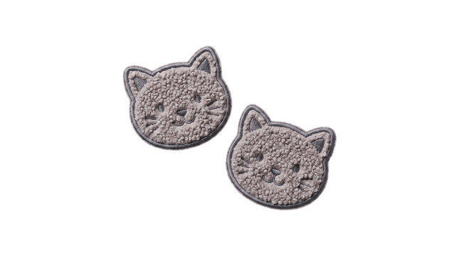 Two fluffy grey cat face embroidered plush patches on a transparent background