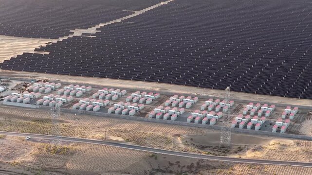 Aerial View of Utility-Scale Solar Farm with Battery Energy Storage System in Arid Desert