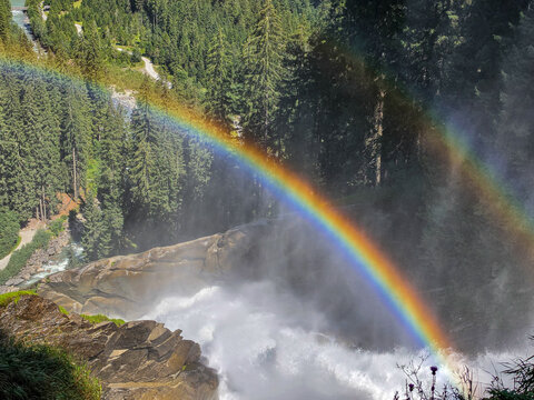 rainbow over waterfall in the alps, krimmler falls