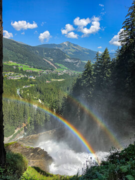 rainbow over the river and krimmler waterfalls