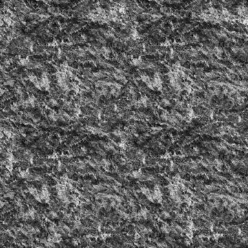 Granite texture presents a rough speckled gray surface with irregular crystalline formations stone grey rock geological mineral geology pattern background material roughness formation geologic earth