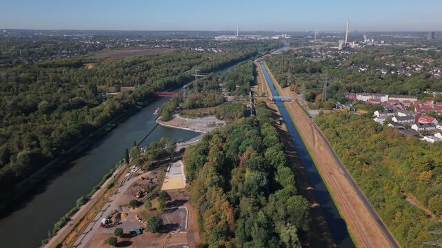 Aerial Drone Flight over Rhine-Herne Canal and Emscher River Construction Site for IGA 2027 in Essen Ruhr Area Germany