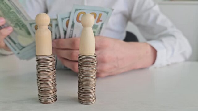 Counting and stacking coins while holding cash notes in a workspace