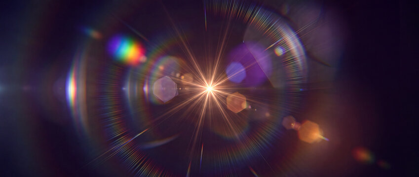Lens flare optical light burst effect featuring vibrant rainbow prism refractions, starburst rays, and hexagonal bokeh glow for photo editing, video overlay, and cinematic graphic design